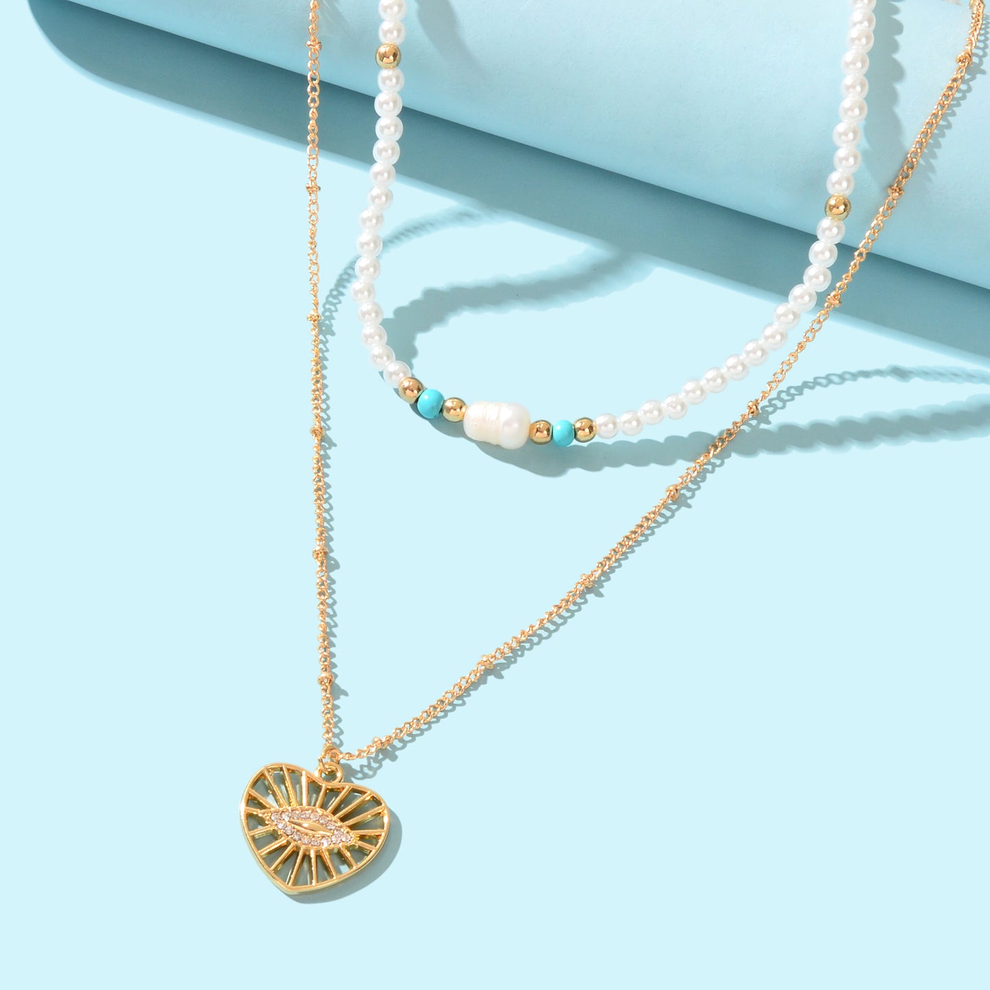 Boho Chic Layered Gold Pearl Beaded Chain Eye Hollow Gold Heart Pendant Necklace