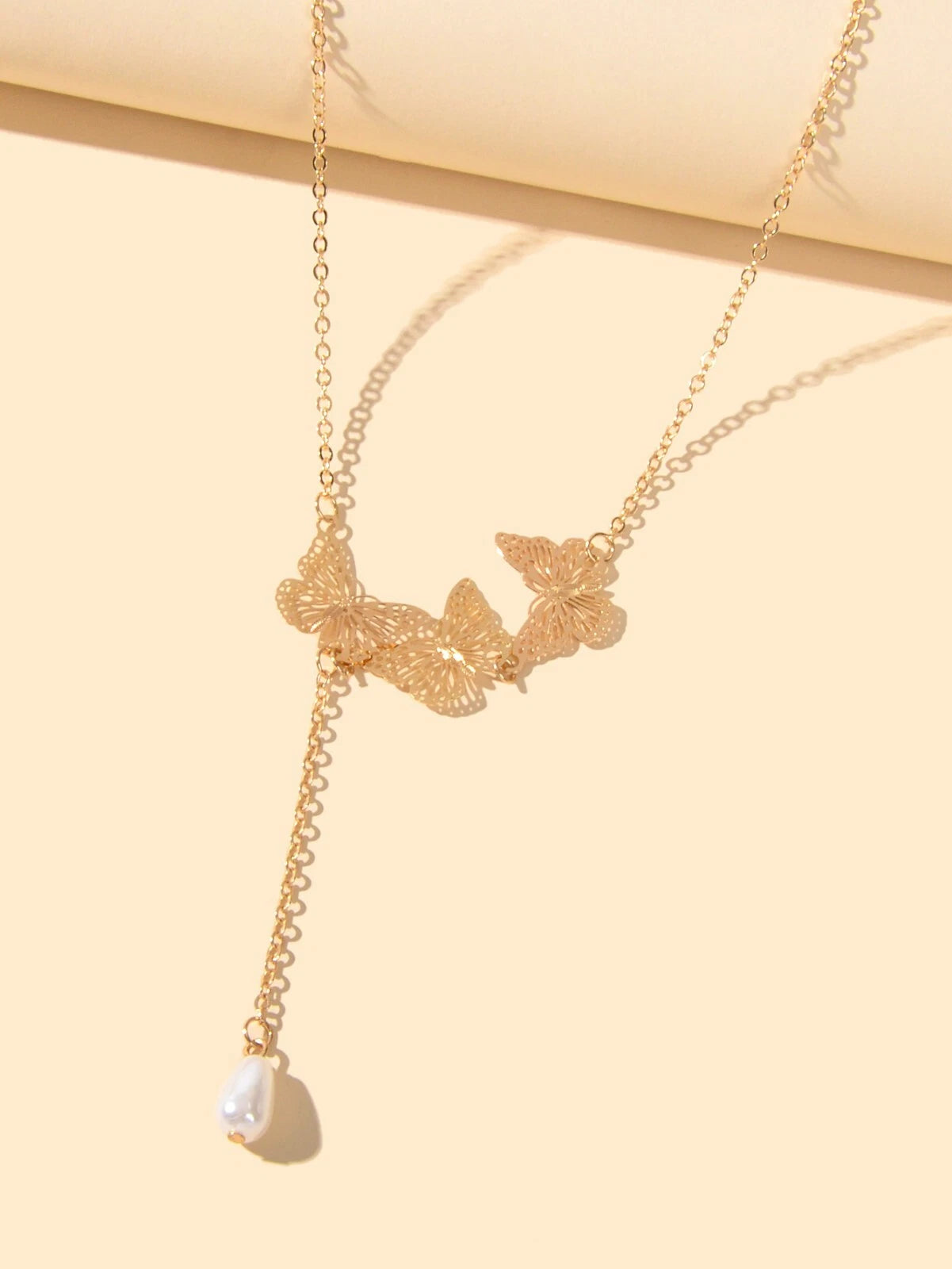Designer Gold Butterfly Pearl Charm Personality Long Chain Dangle Y Necklace